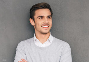 Young man in Grey Sweater